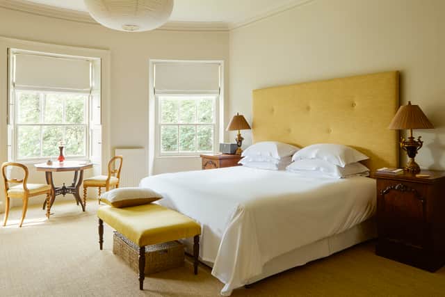 One of the grand bedrooms in the main house