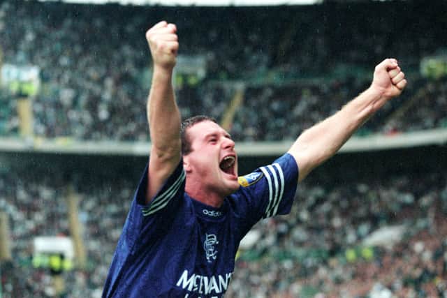 Paul Gascoigne celebrates for Rangers at Celtic Park.