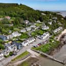 The coastal village of Kippford, with the three striking new homes