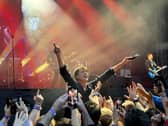 Suede's Brett Anderson comes to see the fans.