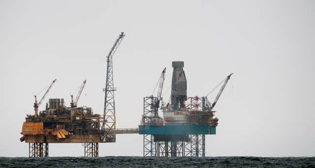 The transition from fossil fuels to green energy is a serious challenge that needs serious people in charge (Picture: Jonathan Nackstrand/AFP via Getty Images)