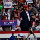 Former US President Donald Trump speaks at a rally at Butler Farm Show in Pennsylvania shortly before he was shot and wounded (Picture: Jeff Swensen/Getty Images)