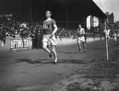 Eric Liddell, pictured winning a race in London in January 2024, the year he won Olympic gold in Paris (Picture: Hulton Archive/Getty Images)