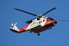 A laser was allegedly shone at an HM Coastguard search and rescue helicopter.