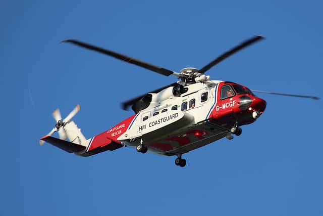 A laser was allegedly shone at an HM Coastguard search and rescue helicopter.