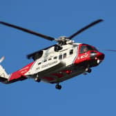A laser was allegedly shone at an HM Coastguard search and rescue helicopter.