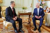 King Charles welcomes Keir Starmer at Buckingham Palace, where he invited the Labour leader to become Prime Minister (Picture: Yui Mok/WPA pool/Getty Images)