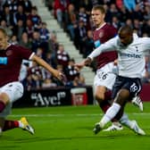 Jermain Defoe blasts a shot on goal at Tynecastle during Tottenham Hotspur's 5-0 win over Hearts in 2011. Cr. SNS Group.