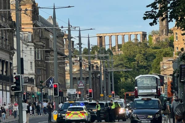 A teenager was charged after an incident in which a pedestrian was hit on Princes Street in Edinburgh