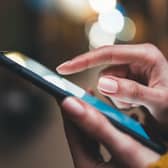 Woman scrolls on a mobile phone.  Photo: A_B_C - stock.adobe.com