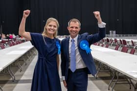 Scottish Conservatives Harriet Cross and Andrew Bowie celebrate after winning their seats in the general election, but the party's vote share was halved (Picture: Michal Wachucik/PA)