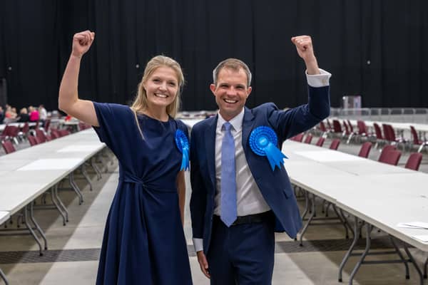 Scottish Conservatives Harriet Cross and Andrew Bowie celebrate after winning their seats in the general election, but the party's vote share was halved (Picture: Michal Wachucik/PA)