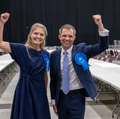 Scottish Conservatives Harriet Cross and Andrew Bowie celebrate after winning their seats in the general election, but the party's vote share was halved (Picture: Michal Wachucik/PA)