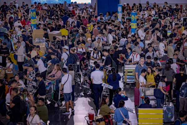There were scenes of chaos at many airports around the world, including Ninoy Aquino International Airport in Manila, Philippines (Picture: Ezra Acayan/Getty Images)