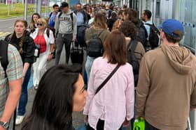 Passengers are queuing around the outside of Edinburgh Airport as the hub is hit by a global IT outage. Picture: Tracy McQue
