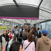 Passengers are queuing around the outside of Edinburgh Airport as the hub is hit by a global IT outage. Picture: Tracy McQue