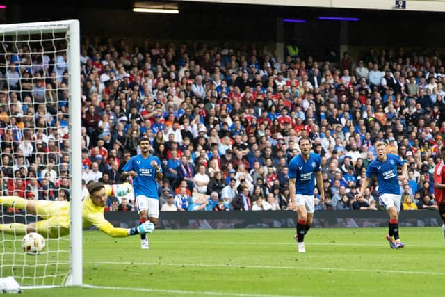 Amad Diallo curls home the opener for Man Utd against his former club.