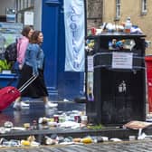 An overflowing bin on Edinburgh's Royal Mile during previous bin strikes