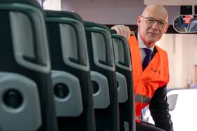 First Minister John Swinney during a visit to meet an innovative consortium of bus operators, led by Zenobe