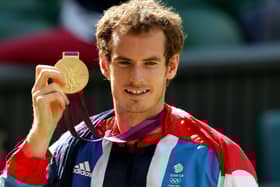 Andy Murray with his gold medal after beating Switzerland's Roger Federer in the final at Wimbledon in 2012