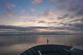 A boat looking across towards the Isle of Arran, which lies within one of the highest rated council areas in Scotland