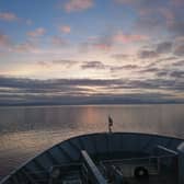 A boat looking across towards the Isle of Arran, which lies within one of the highest rated council areas in Scotland