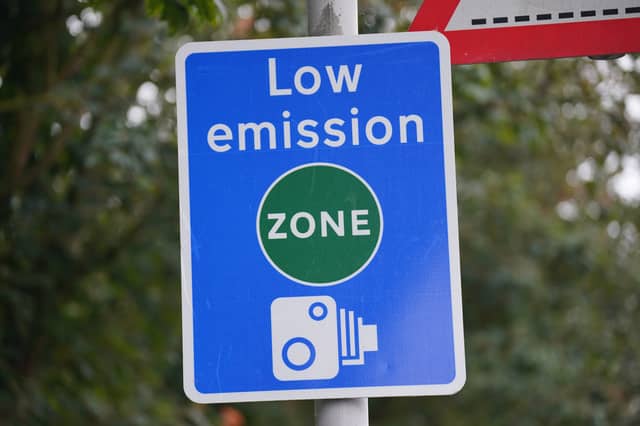 Low-emission zones are becoming increasingly common in cities across the UK (Picture: Lucy North/PA)