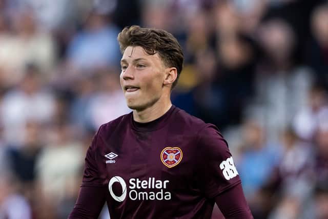 Aidan Denholm has joined Ross County on loan from Hearts.