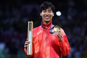 Japanese fencer Koki Kano with his gold medal at the Paris Olympics - but what's in the box?