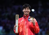Japanese fencer Koki Kano with his gold medal at the Paris Olympics - but what's in the box?