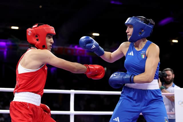 Imane Khelif of Team Algeria and Angela Carini of Team Italy exchange punches during the Women's 66kg preliminary round match on day six of the Olympic Games
