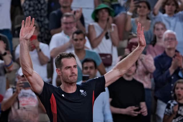An emotional Andy Murray waves goodbye to the Paris crowd