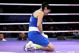 Italy's Angela Carini fell to her knees after abandoning her boxing bout against Algeria's Imane Khelif at the Olympic games on Thursday (Picture: Richard Pelham/Getty Images)