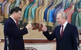 Russian President Vladimir Putin and China's President Xi Jinping toast each other following talks at the Kremlin in March 2023 (Picture: Pavel Byrkin/Sputnik/AFP via Getty Images)