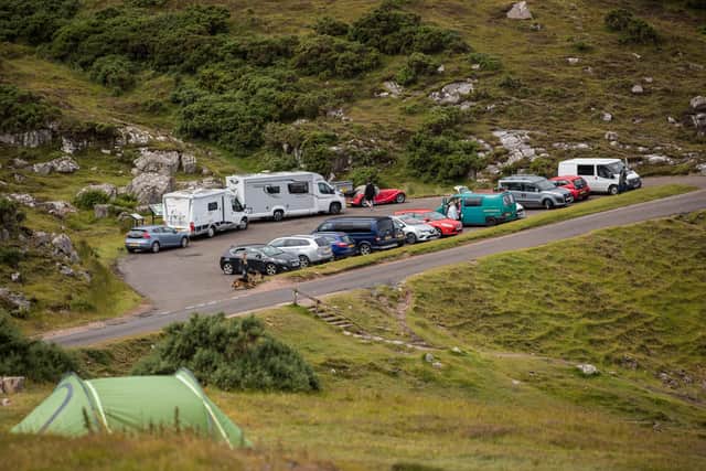 Visitors near Ullapool on the North Coast 500.