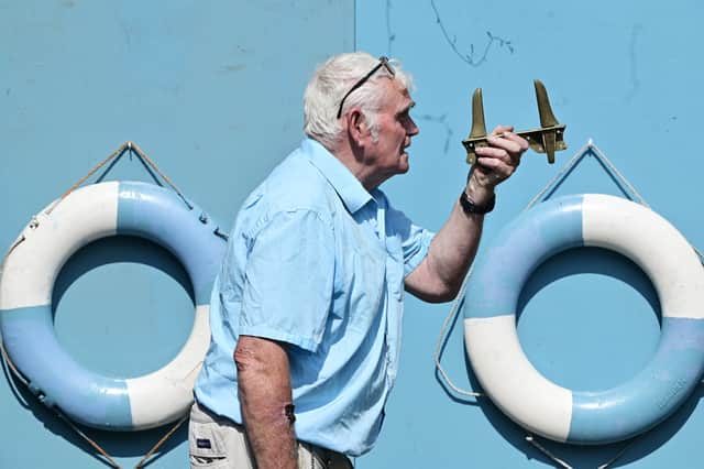 Former Glasgow Humane Society officer George Parsonage with the rowlocks of the boat that won the 1900 World Lifesaving Championships in Paris