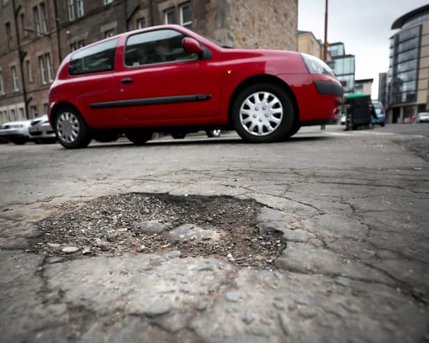 A pothole on Gardner's Crescent, Edinburgh. Picture: Jane Barlow/PA Wire