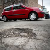 A pothole on Gardner's Crescent, Edinburgh. Picture: Jane Barlow/PA Wire