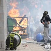 Anti-migration protesters are seen during riots outside of the Holiday Inn Express in Manvers, which is being used as an asylum hotel, in Rotherham. Picture: Christopher Furlong/Getty Images