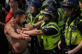 Police clash with right-wing protesters in Manchester's Piccadilly Gardens (Picture: Christopher Furlong/Getty Images)