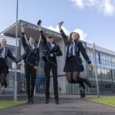 Pupils (from left to right) Erin Boothman, Charlotte Findlay, Dan Griffiths and Sean Bull celebrate receiving their exam results at Williamwood High School