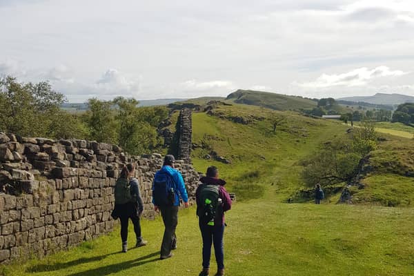 Women Walking Hadrian's Wall in the North of England on a guided trek
