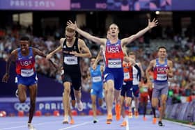 Josh Kerr takes second place behind gold medalist Cole Hocker in the men's 1500m final at the Stade de France.