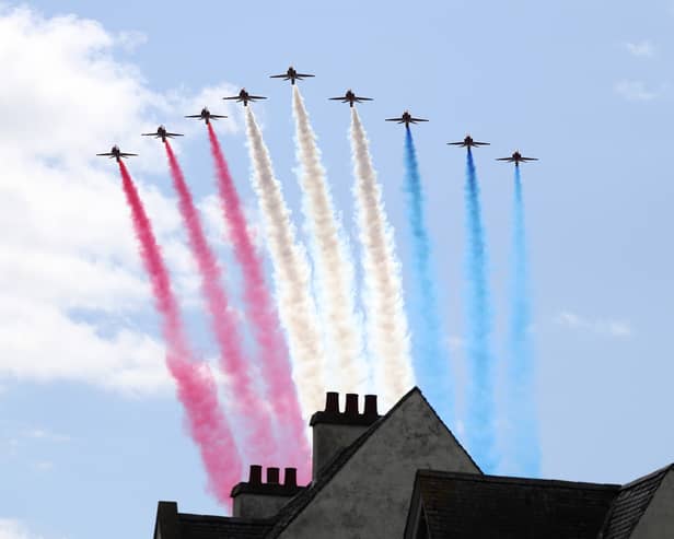 The Royal Airforce Red Arrows fly past over St Giles' Cathedral in Edinburgh. Picture: Scott Heppell - WPA Pool/Getty Images