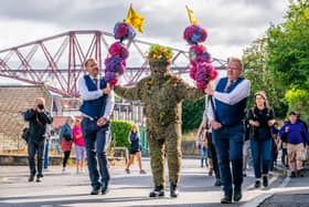 Burryman Andrew Taylor parades through the town of South Queensferry, near Edinburgh, encased in burrs. The parade takes place on the second Friday of August each year and although the exact meaning of this tradition has been lost through the years it is thought to have begun in the 17th century
