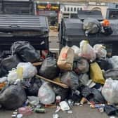 Overflowing bins were a common sight during previous strike action in Edinburgh in 2022. Picture: National World