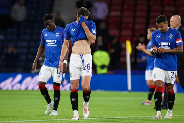 The Rangers players trudge off the pitch after losing 2-0 to Dynamo Kyiv.