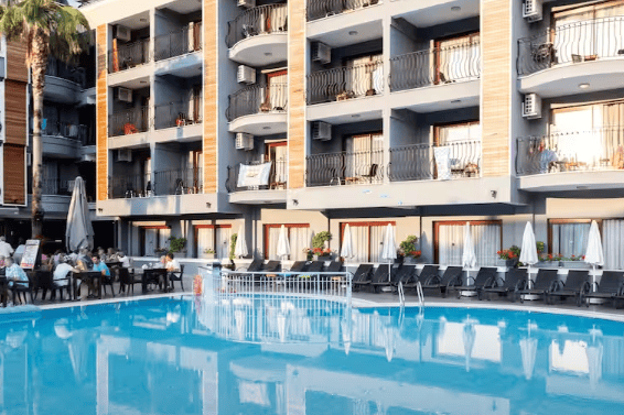 Relax by the pool at the Club Viva Hotel