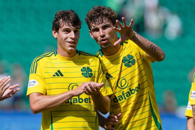 Matt O'Riley, right, and Paulo Bernardo celebrate after Celtic's 2-0 win over Hibs at the weekend.