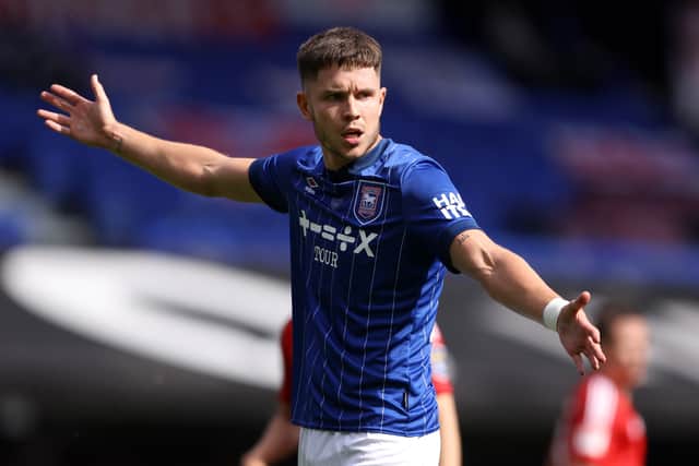 Ipswich Town striker George Hirst qualifies to represent Scotland.